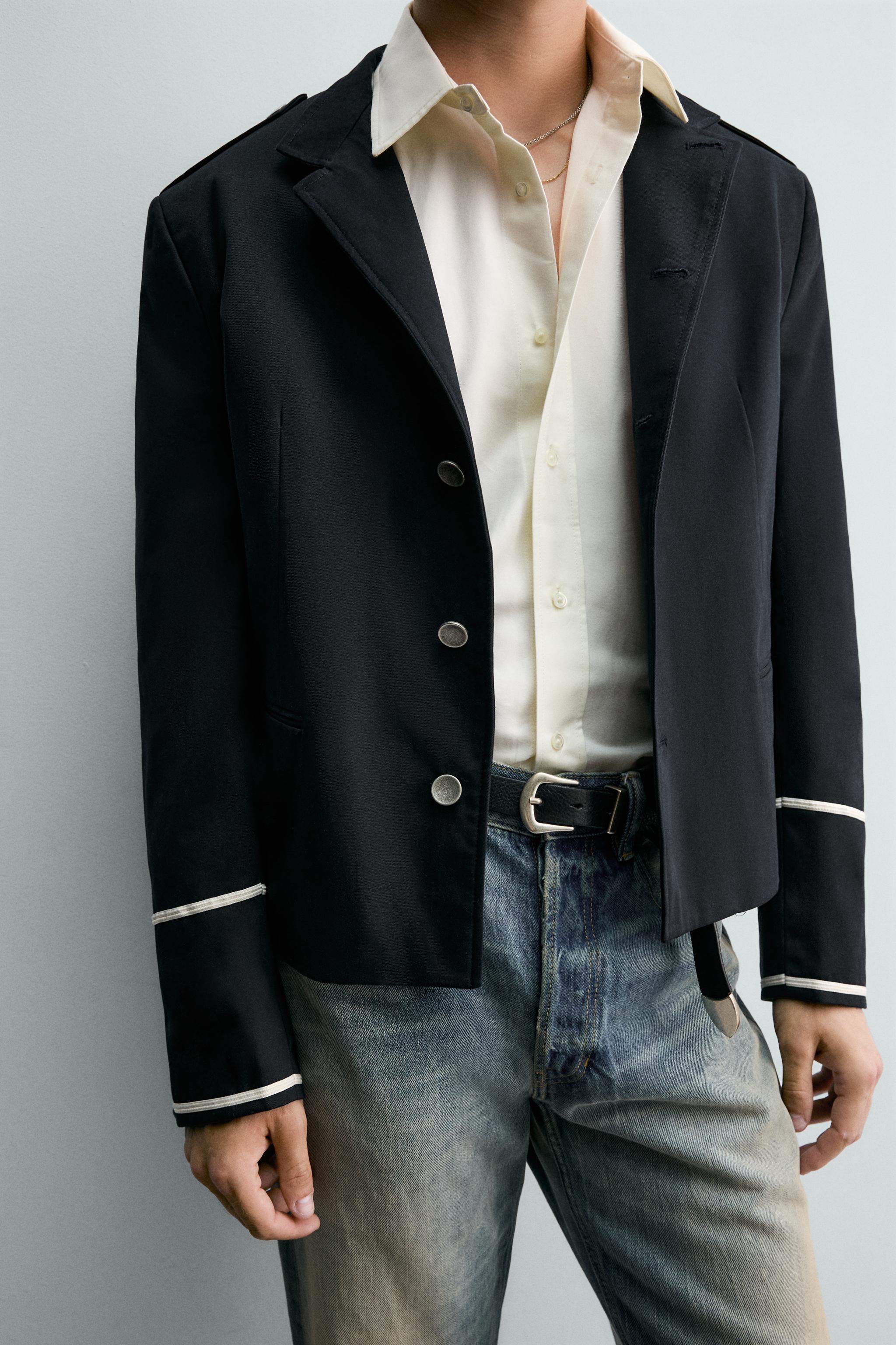VESTE COURTE À CONTRASTES